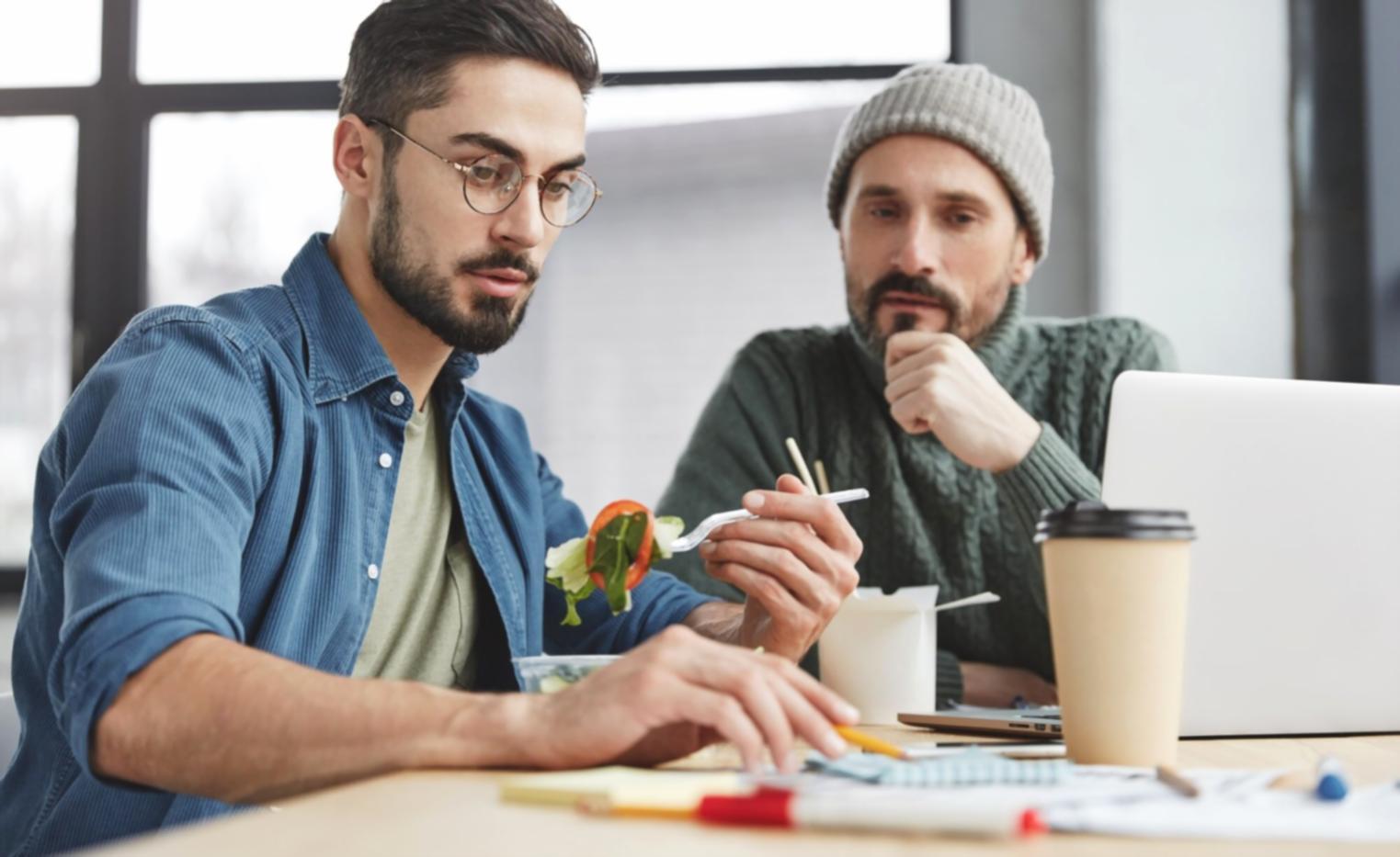 Interactive learning session showing budget compliance concepts on digital displays